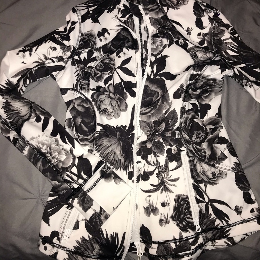 Black and white lululemon athletic zip up jacket